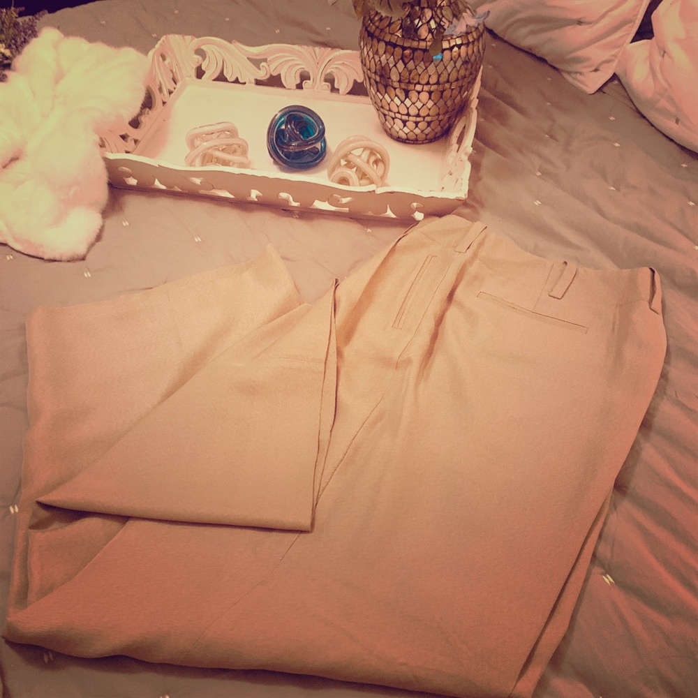 Tan pleated capri dress pants with lining.